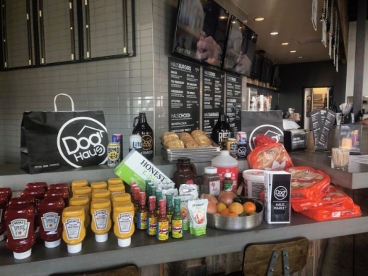 Items in the Haus Market include ketchup, mustard, juices, fruits and vegetables, King's Hawaiian Rolls, cookies and more. (Courtesy Dog Haus Biergarten)