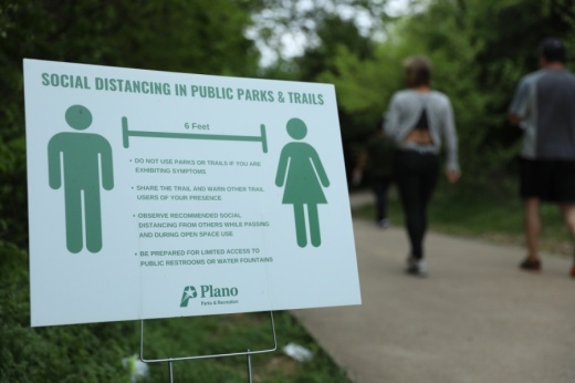 Social distancing signs have been placed in all Plano public parks. The city announced March 31 it would soon send employees to every major park in Plano to monitor visitors. (Liesbeth Powers/Community Impact Newspaper)  