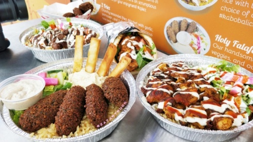 This menu assortment features a variety of foods offered from Zatar. (Courtesy LDWW Group)