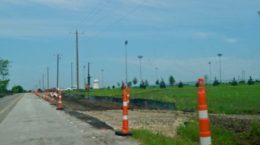 Construction is underway on installing a left-turn lane off Cameron Road heading into 1849 Park,  with expected completion in June 2020. (Kelsey Thompson/Community Impact Newspaper)