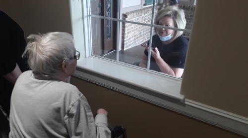 Should residents living at New Haven Assisted Living in Spring need more than virtual conversations over digital platforms, families can also visit their loved ones through residents’ windows and speak by phone. (Courtesy New Haven Assisted Living in Spring)