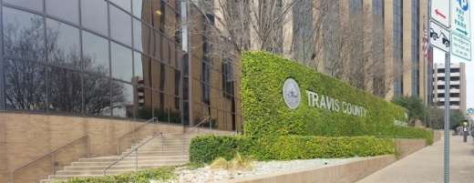 A photo of the Travis County government building
