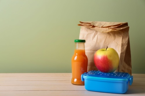 The district is working to clear lunch debts before school reconvenes. (Courtesy Adobe Stock)