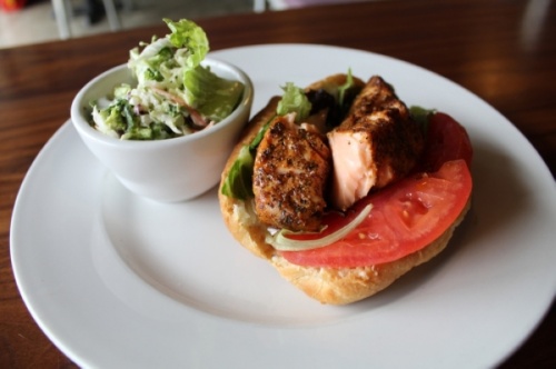 Alpharetta restaurant Wildflour's menu includes the salmon sandwich. Wildflour is one of the restaurants remaining open for takeout and delivery via DoorDash while dine-in services are temporarily suspended due to the outbreak of COVID-19. (Kara McIntyre/Community Impact Newspaper)