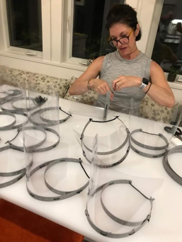 Bellaire families pitched in to create 500 face shields that have gone to local healthcare workers. Courtesy Hannah Nates