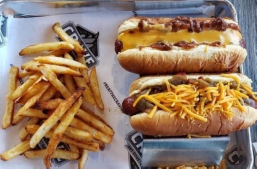 Menu offerings include pulled chicken and pork sandwiches, brisket, smoked sausages and traditional Southern sides. (Courtesy Crave Hot Dogs and Barbecue)