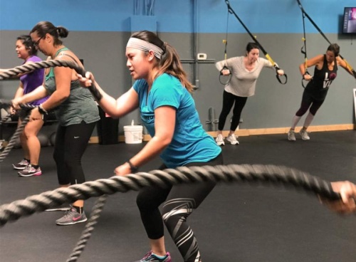 The female-focused fitness studio hosts 30-minute Tone & Torch classes and offers child supervision. (Courtesy Delta Life Fitness)