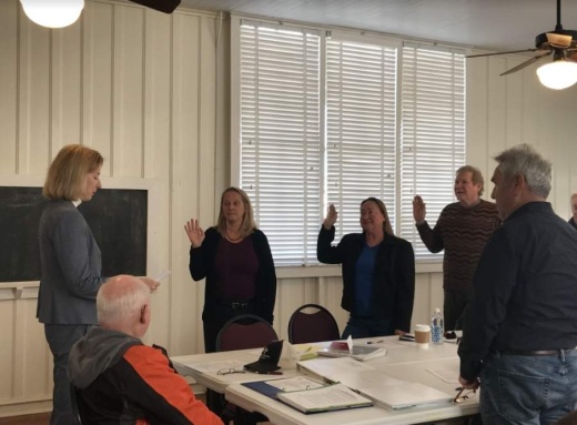 State Rep. Vikki Goodwin (left), D-Austin, swears in the newly elected directors of the Southwest Travis County Groundwater Conservation District on Nov. 15. (Amy Rae Dadamo/Community Impact Newspaper)