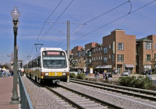 A former auto shop (not pictured) will undergo extensive renovations next to the Dallas Area Rapid Transit rail line in downtown Plano. (Gavin Pugh/Community Impact Newspaper)