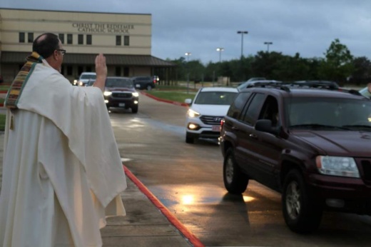 More than 100 cars fill the parking lot as Christ the Redeemer Catholic Church in Houston holds its first “drive-in benediction” event for its congregants March 20. The Diocese of Austin announced it will resume public Mass on May 5. (Courtesy Christ the Redeemer Catholic Church)