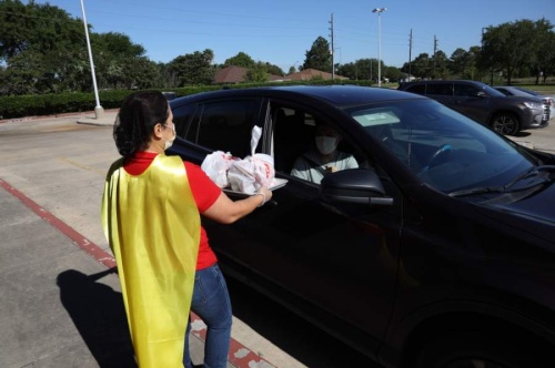Katy ISD celebrated School Nutrition Hero Day on May 1 to thank its nutrition and food service employees for their hard work. Employees dressed as superheroes as they gave out free meals to children. (Courtesy Katy ISD)