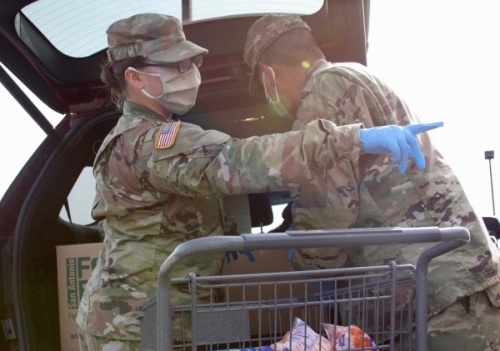 "[The National Guardsmen] have been such a blessing to us and they've helped take over the operation and the distribution," said New Braunfels Food Bank Executive Director Monica Borrego. (Lauren Canterberry/Community Impact Newspaper)