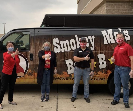Smokey Mo's BBQ employees prepare to deliver meals to Cedar Park Regional Medical Center on May 5. (Courtesy Smokey Mo's BBQ)