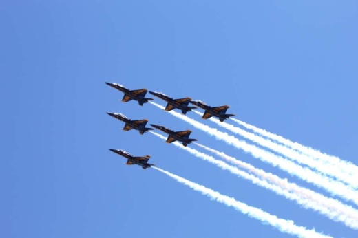 The U.S. Navy Blue Angels conduct a flyover of the Dallas-Fort Worth metroplex in support of first responders, health care and essential workers during the coronavirus pandemic. (Ian Pribanic/Community Impact Newspaper)