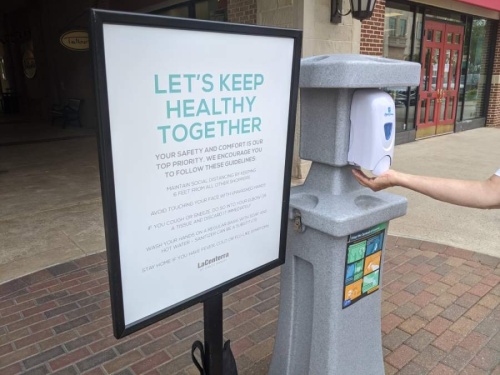 LaCenterra at Cinco Ranch offers several hand disinfecting stations for guests throughout the shopping mall. (Jen Para/Community Impact Newspaper)