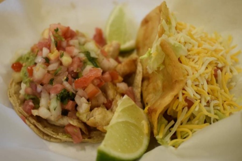 Oscar's Taco Shop has a variety of tacos on its menu for $3 or less, including the chicken taco (left) and the ground beef taco (right). (Alex Hosey/Community Impact Newspaper)