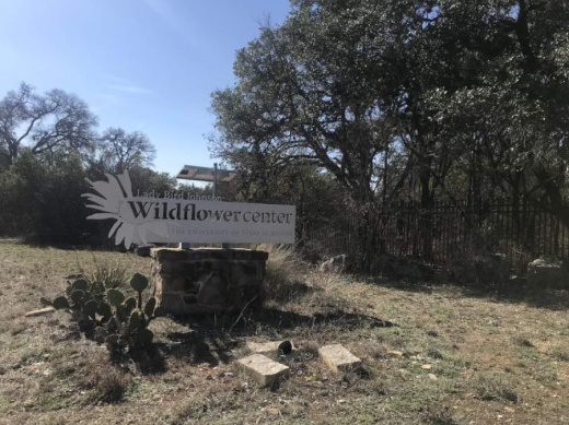 A photo of the Wildflower Center welcome sign