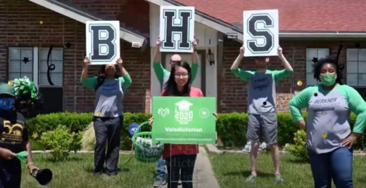District staff dropped off a yard sign to the Berkner High School valedictorian in late April. (Courtesy YouTube)