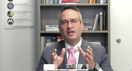 A screen shot of Dr. Mark Escott speaking