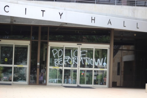 Austin City Hall was one of several downtown buildings to be vandalized during this past weekend's protests. (Christopher Neely/Community Impact Newspaper)