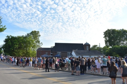 Hundreds of Franklin residents overflowed from the corner of the First Missionary Baptist Church parking lot to listen to church leaders, educators, city officials and concerned citizens speak out against systemic racism across the county at a candlelight vigil held June 2. (Alex Hosey/Community Impact Newspaper)