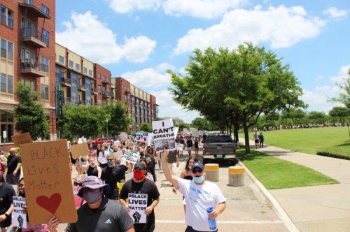 More than 3,000 protesters march through Keller Town Center during a George Floyd protest on June 7. (Ian Pribanic/Community Impact Newspaper)