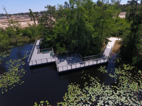 The new Atascocita Park features a boardwalk overlooking a 2-acre natural lake. (Courtesy Harris County Precinct 2)