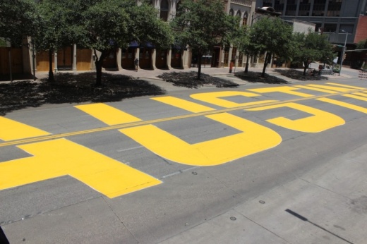 The Black Austin Matters street mural stretches along three blocks on Congress Avenue. (Christopher Neely/Community Impact Newspaper)