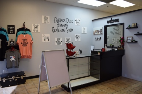 A retail area offers T-shirts and dog accessories. (Courtesy Dapper Dogs Premier Grooming Salon)