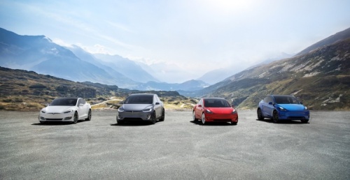 A photo of four Tesla vehicles