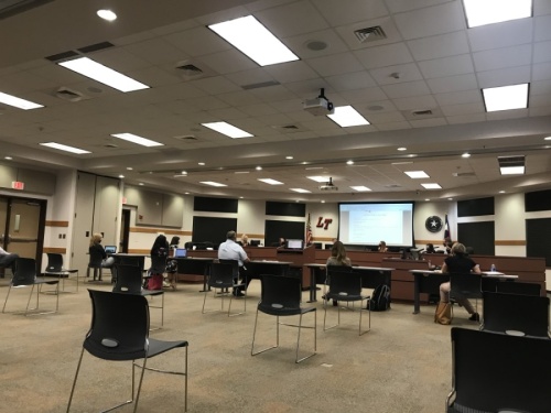 Lake Travis ISD trustees met July 15 for their first in-person board meeting since March. Social distancing guidelines and masks were required for all attendees. (Amy Rae Dadamo/Community Impact Newspaper)