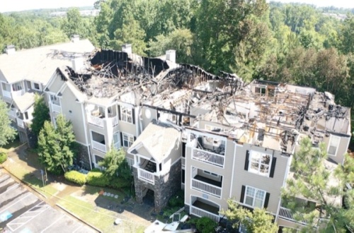 Drone footage of IMT Deerfield apartment complex burned and roof scorched