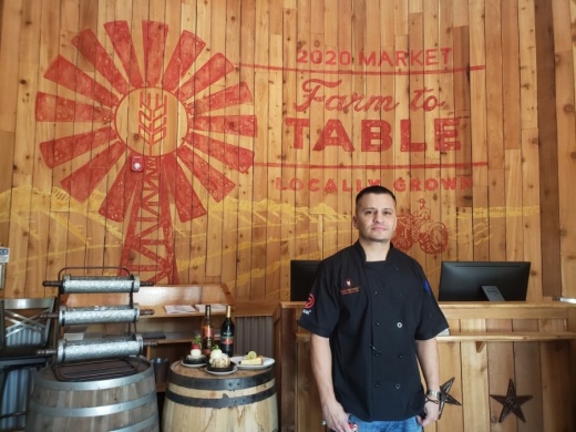 Joey Delgadillo, along with Manuel Martinez, co-owns 2020 Market Scratch Kitchen & Bar in Georgetown. (Ali Linan/Community Impact Newspaper)