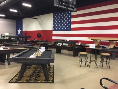 The company sells pool tables and accessories, dart boards, bars and stools, and other game room products. (Courtesy Billiard Factory)