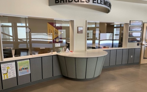 The installation of plexiglass in schools' front offices, such as at Bridges Elementary School, is among the mitigation strategies Higley USD is using to prevent the spread of the coronavirus. (Courtesy Higley USD)