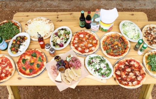 Pizza Americana offers a variety of pizzas, wine and beer. (Courtesy Pizza Americana)