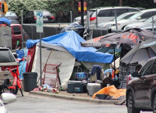 A camp is set up by someone experiencing homelessness in August 2019. (Christopher Neely/Community Impact Newspaper)