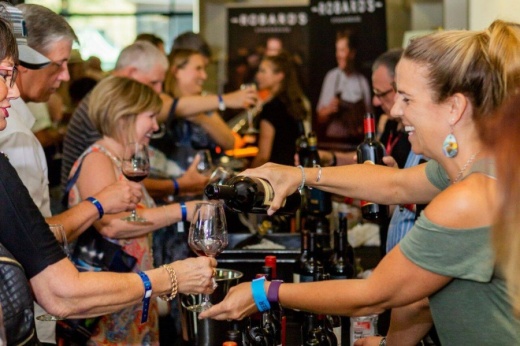 Attendees sample a wide variety of global wines and cuisine during Wine & Food Week. (Courtesy Food & Vine Time Productions)