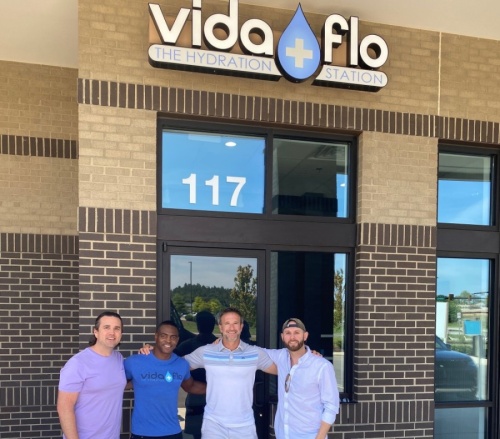 Owners Parker Turner, Dr. Howard Aubert, Adam Will and Michael Haley will open a new location of Vida Flo later this month. (Courtesy Vida Flo)
