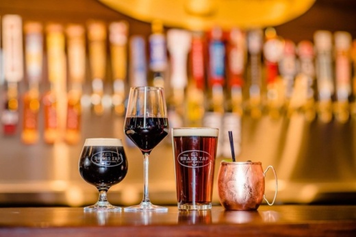 The Brass Tap reopened its location in downtown Round Rock on Aug. 10, as well as partnering with Wiseguys: A Chicago Eatery in launching a food truck. (Courtesy The Brass Tap)