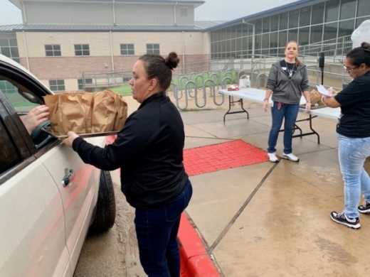Lake Travis ISD’s Food and Nutrition Services provided free meals through a grab-and-go drive-thru at the district’s elementary and middle schools. (Courtesy Marco Alvarado)