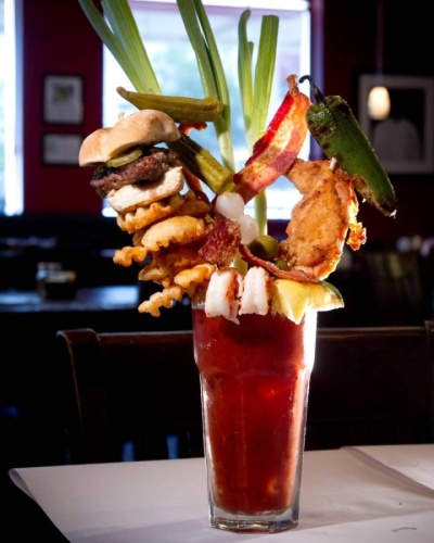 This bloody Mary includes a skewered slider, fried chicken, waffle fries and more. (Courtesy Chef Point Bar & Restaurant)