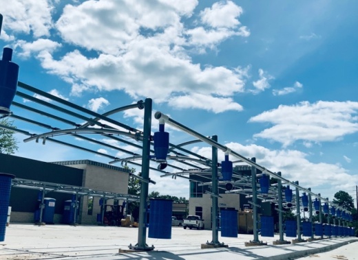 The express car wash was rebuilt to include 150-foot car wash tunnels, contactless payment systems and free self-clean vacuums. (Courtesy Shiner's Express Car Wash)
