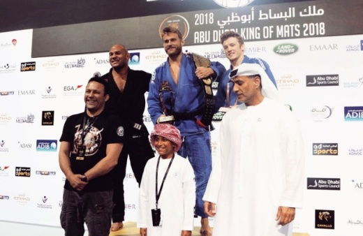 Alexander Hilligsoe Trans (center) is a former jiujitsu fighter who has competed and earned top titles in national and world championships. He will open his first gym, Progresso Jiu Jitsu, in Plano in mid-September. (Courtesy Alexander Hilligsoe Trans)