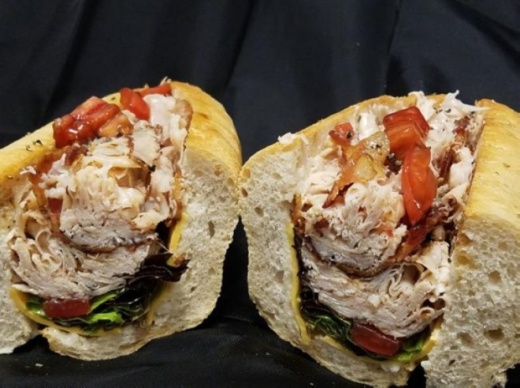 The K. Corleone ($10.95) includes roasted turkey, apple bacon, American cheese, Roma tomatoes, mayonnaise and spring lettuce on crusty Italian bread. (Courtesy Tony's Delicatessen)