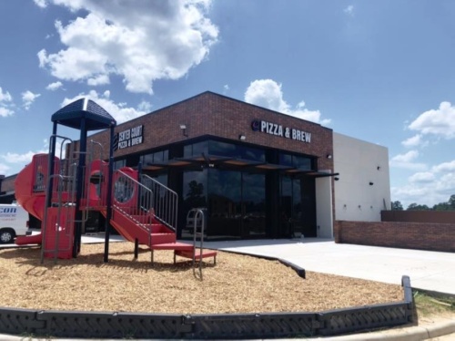 The new location will feature a full bar with craft beer and and outdoor playground. (Courtesy Center Court Pizza & Brews) 