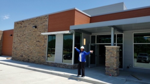 Zenae Campbell, vice president of programs and club operations at Boys & Girls Clubs of Greater Houston, is seen in front of the new Mission Bend facility. (Courtesy Boys & Girls Clubs of Greater Houston)