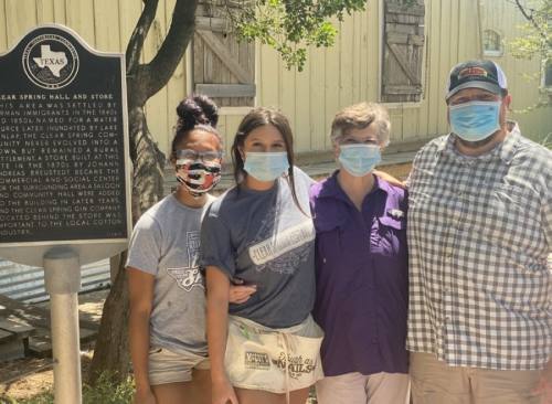From left: Employees Mackenzie Barefield, Marissa Flores and Jamie Krivacka and General Manager Harry Kelly work during the lunch rush at Clear Springs in New Braunfels. (Photos by Brian Rash/Community Impact Newspaper)