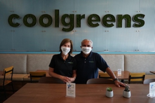 Shanna and Luis Argote signed the Southlake Safe pledge for the restaurant, Cool Greens. (Gavin Pugh/Community Impact Newspaper)