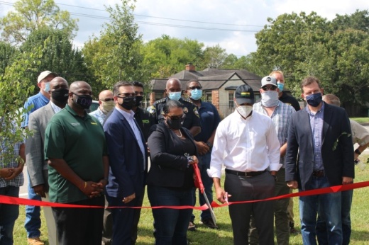 City Council members and city staff participated in a ribbon-cutting to usher the city from Phase One to Phase Two of the citywide beautification project. (Claire Shoop/Community Impact Newspaper)